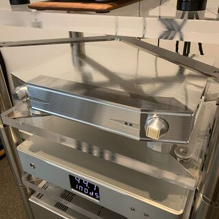 High-end polished audio component on display featuring TF Design casing