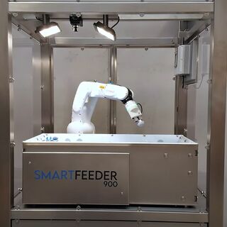 SmartFeeder 900 robotic system with integrated robotic arm in stainless steel frame