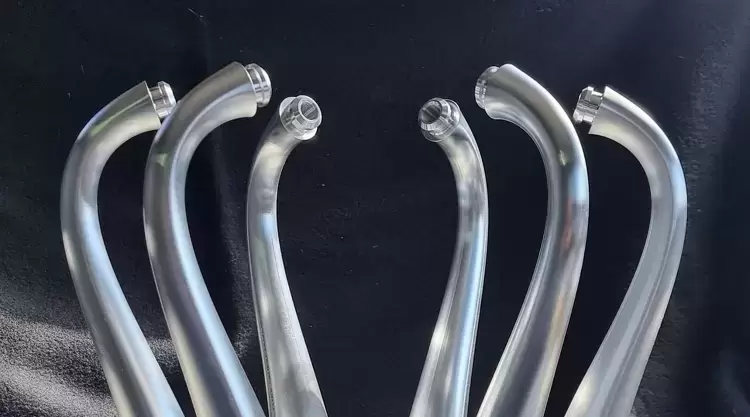 Curved aluminium tubes engineered and manufactured for custom industrial use by TF Design